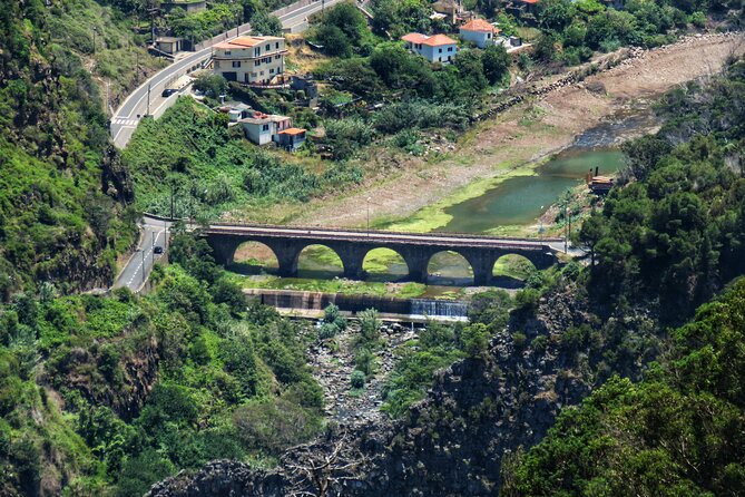 Full Day Guided Tour to The Charms of Northeast Madeira - Santana Palheiros: quick architecture and a theme stop