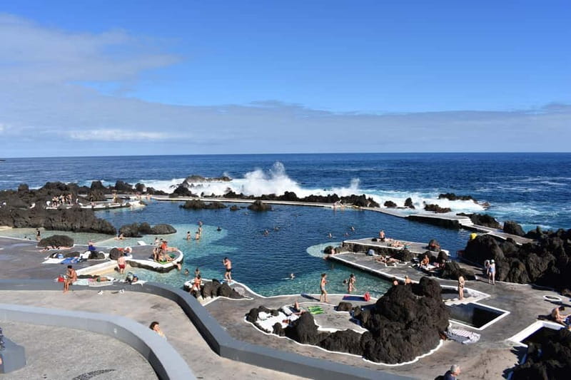 Funchal: Waterfalls, Volcanic Pools, and Fanal Forest Tour - Ponta do Sol and Cascata dos Anjos: A Waterfall in the Middle of the Road